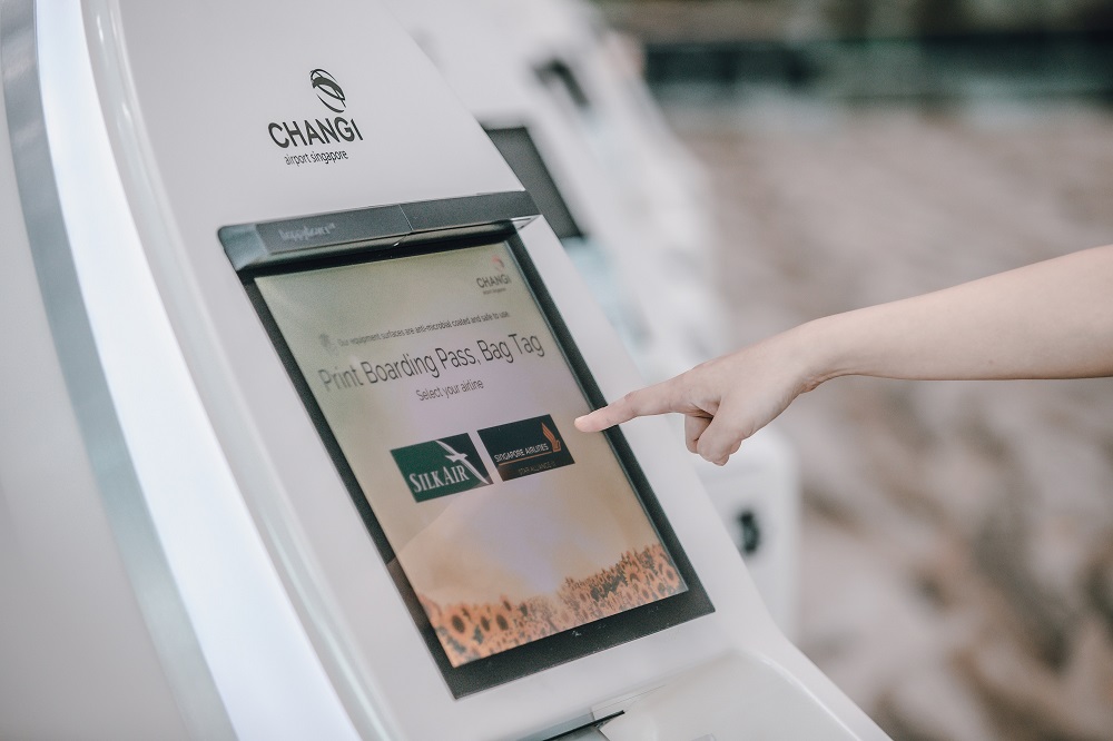 Proximity sensors installed at automated kiosks enables passengers to select options by pointing fingers close to screen
